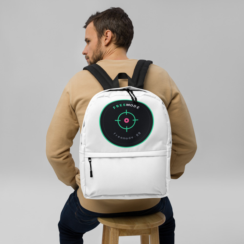 freemode backpack — the green-and-black crosshair roundel printed on the front of a white backpack